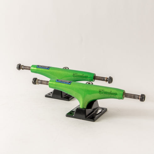 Thunder - Hollow Lights Metallic Script Green Trucks (147/149)