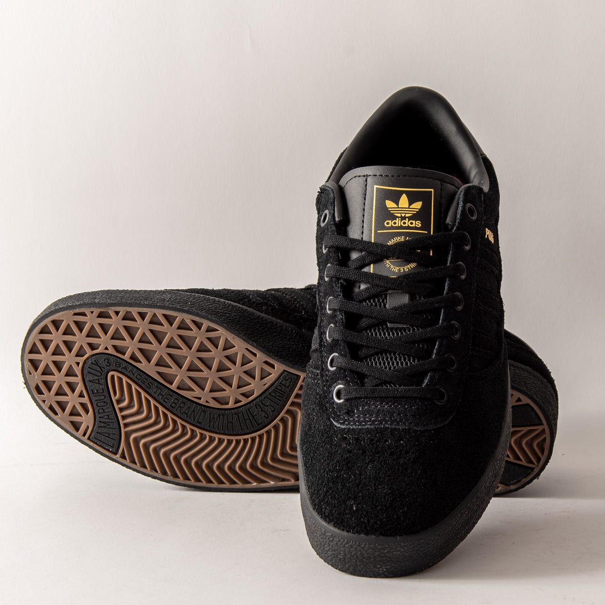 plain black adidas trainers