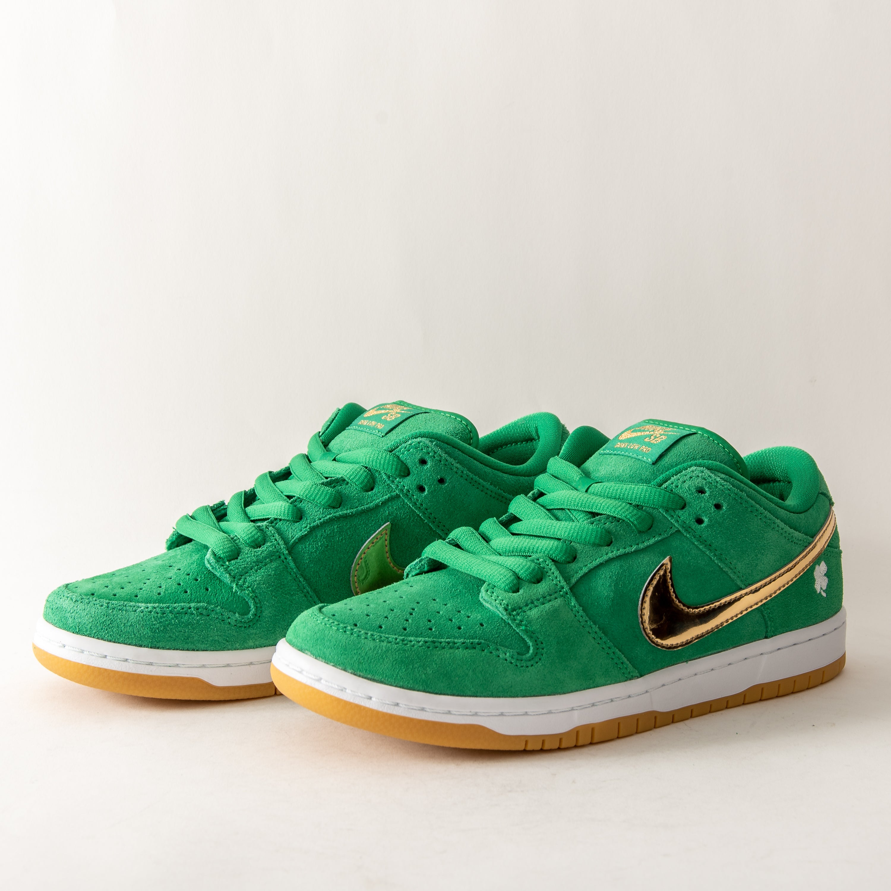 Green and gold nike 2025
